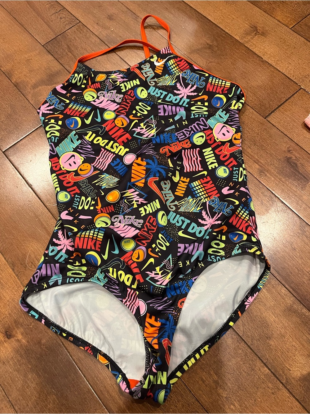 Nike Kids Black One-Piece Swimsuit with Neon Multicolor Graphics